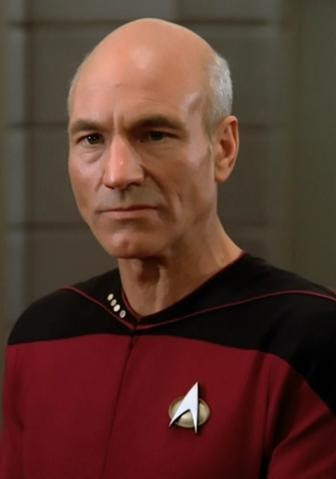 http://img2.wikia.nocookie.net/__cb20130514222545/trek-initiative/images/4/4d/336px-Jean_Luc_Picard_2364.jpg